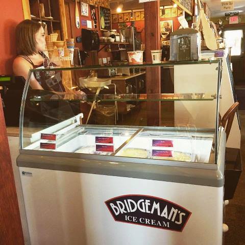 Front Porch Coffee & Tea Co. in Ely Minnesota scooping up Bridgeman's Ice Cream